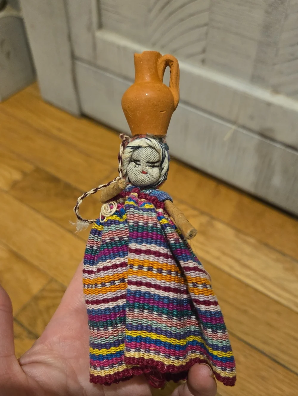 Handcrafted Multicolor Textile Doll with Orange Ceramic Pitcher Hat Guatemala